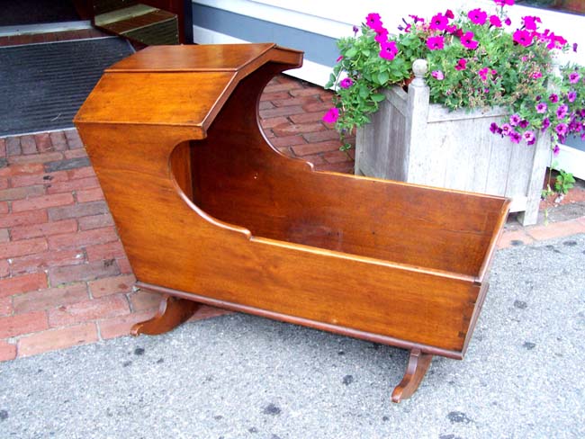 A charming early 19th century American Mahogany Child's Cradle with Canopy circa 1820-1830